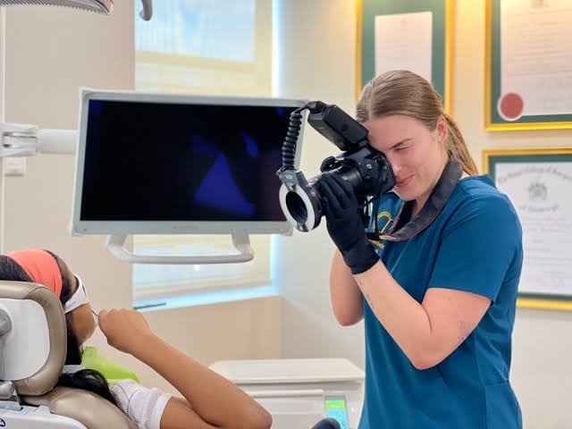 Orthodontist performing a clinical examination of a patient's teeth for orthodontic treatment in Patna