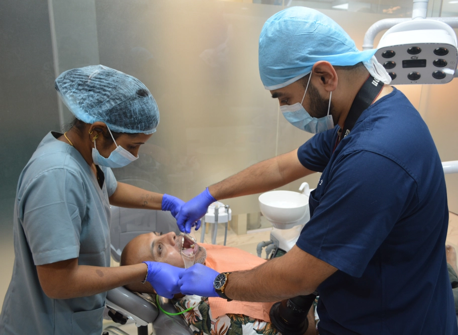 Dentist performing cosmetic dental treatment execution during smile makeover in Patna