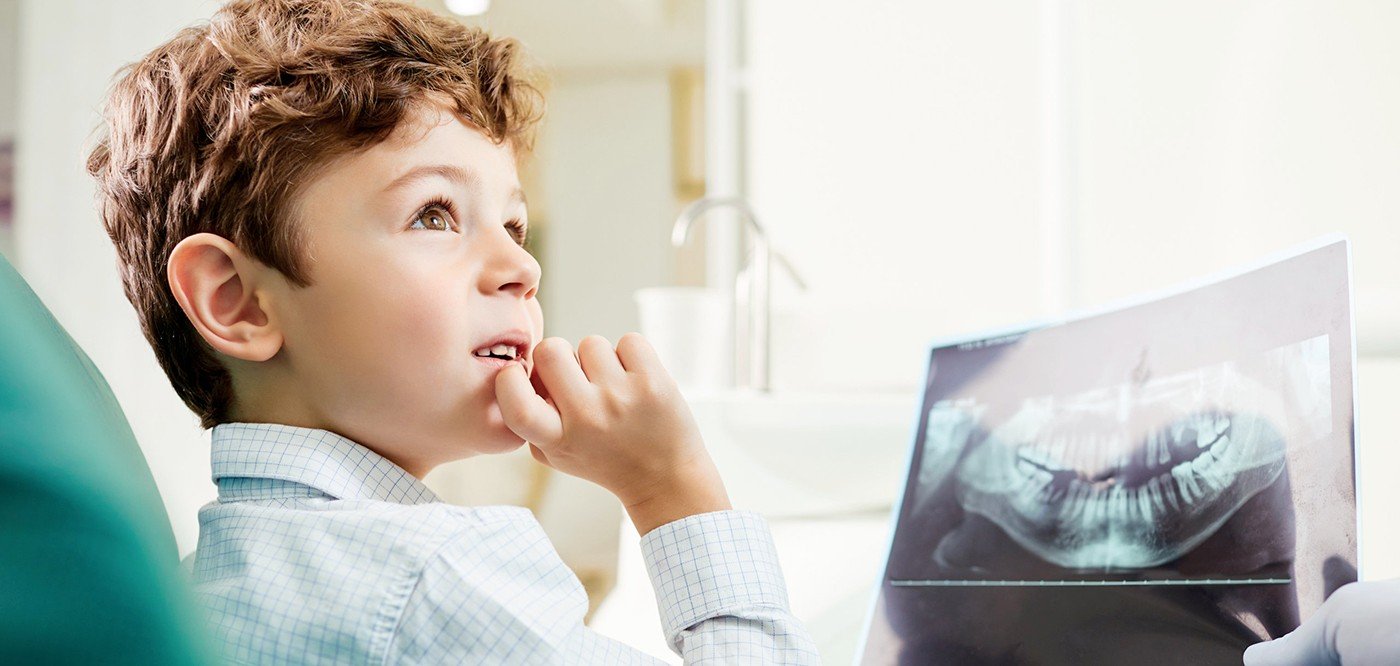 Digital X-ray being taken for a child during pediatric dental check-up in Patna