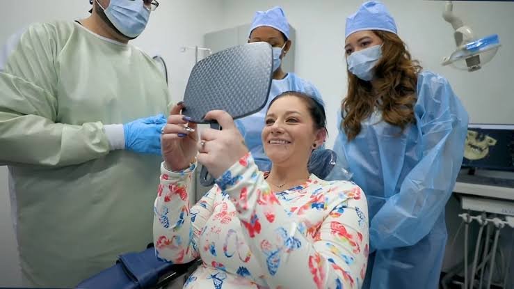 Dentist checking gum healing during recovery and follow-up visit after gum treatment in Patna