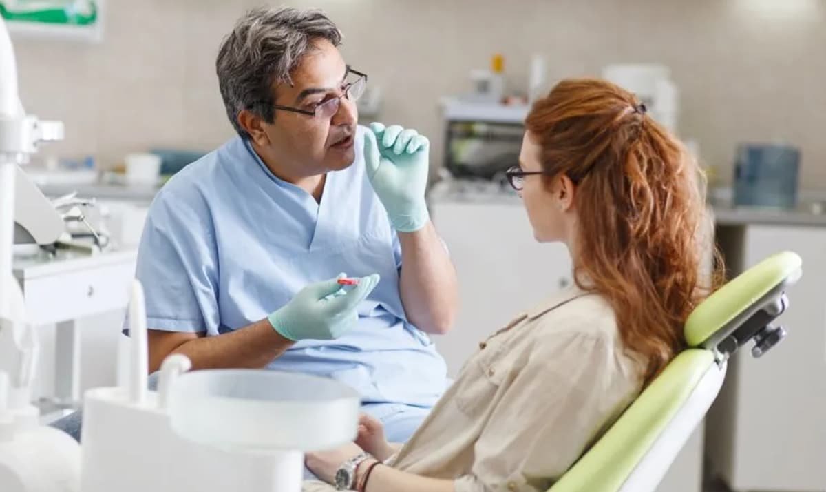 Dentist reviewing recovery and follow-up progress after oral cancer treatment in Patna
