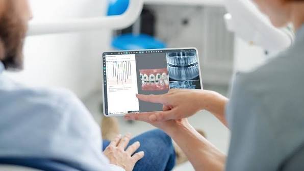 Orthodontist explaining personalized treatment planning for braces and aligners in Patna