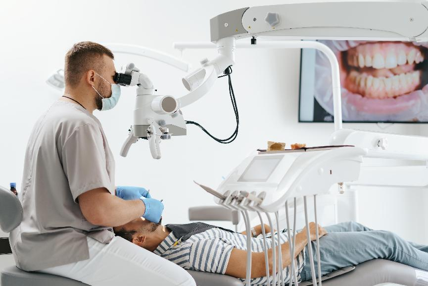 Dentist performing obturation sealing procedure during root canal treatment in Patna
